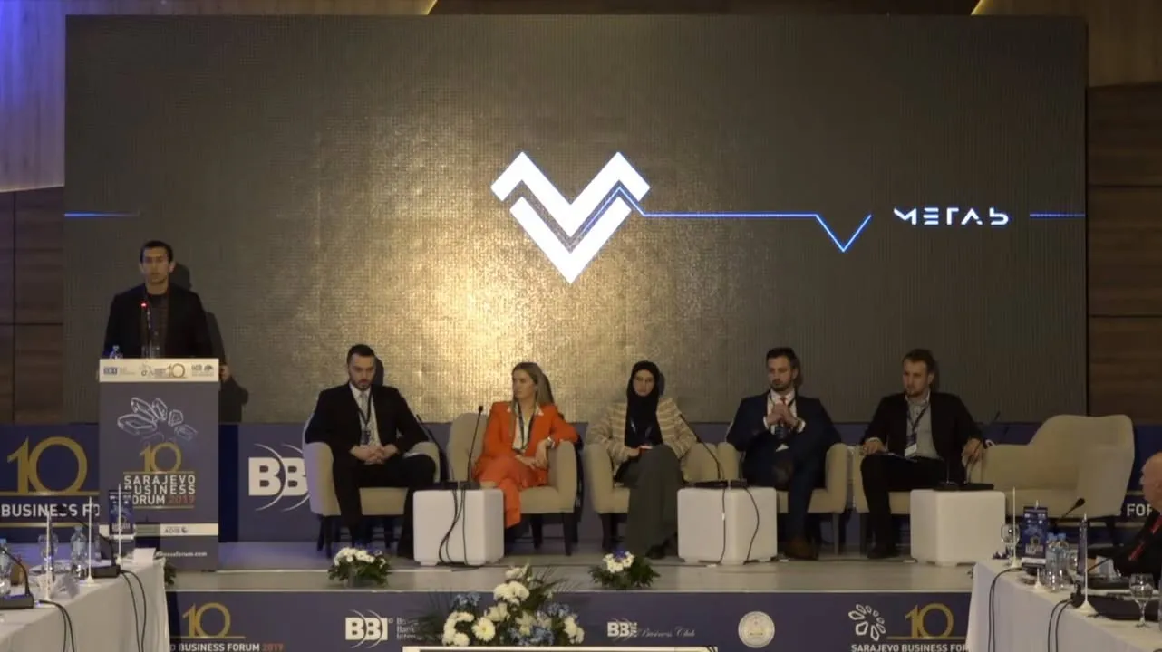 A panel on the stage of the Sarajevo Business Forum 2019, with the META5 logo on the large screen behind the speakers